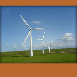 Three wind turbines in a field